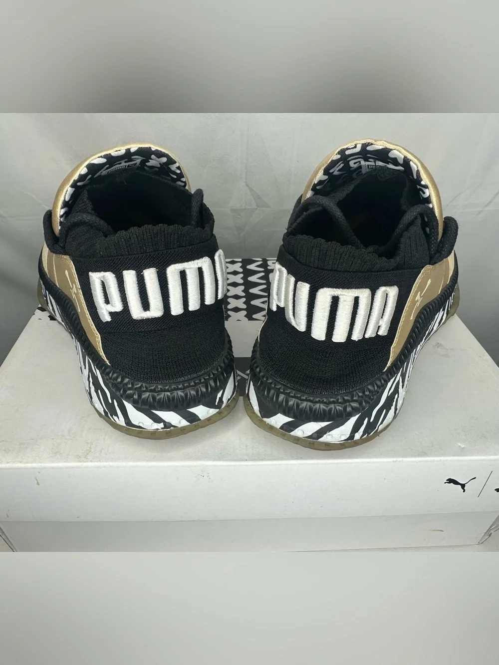 Puma Metallic Gold Sneakers with Black Details